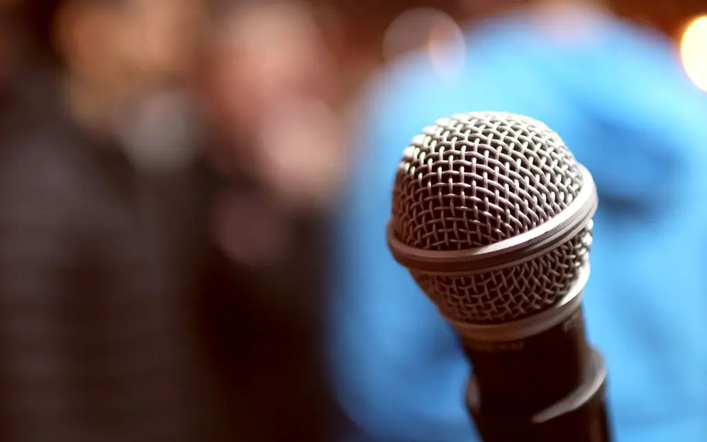 A microphone on a comedy stage