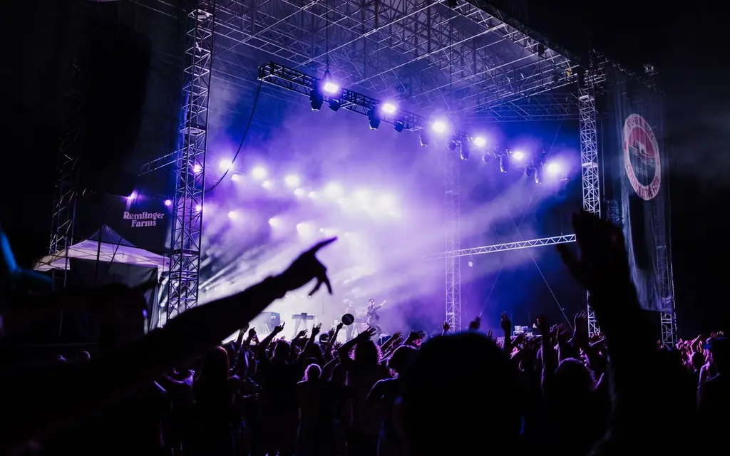 Concert crowd under stage lights