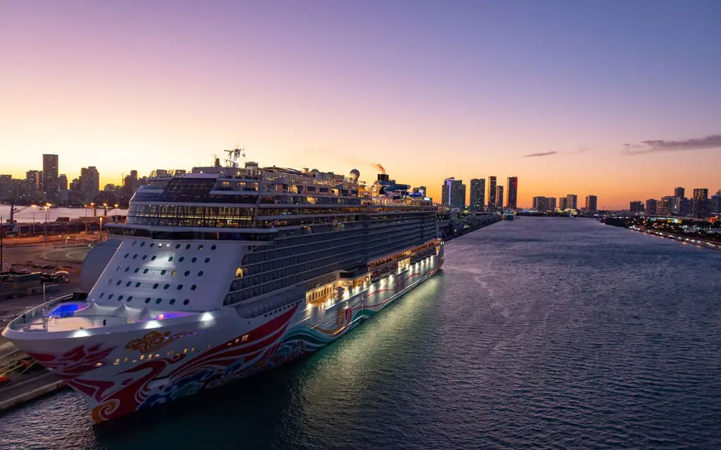 Cruise ship docked at dusk