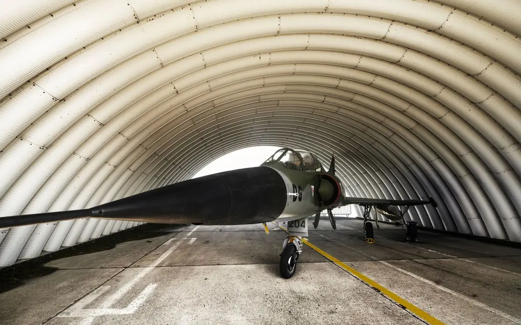 Light aircraft inside a hangar