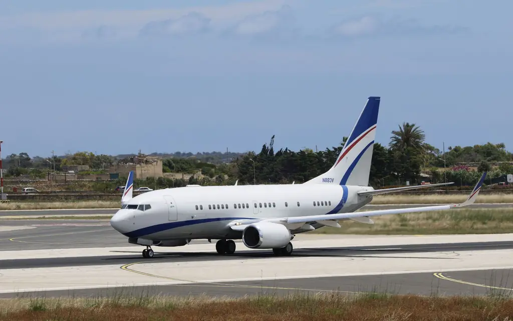 Business jet taxiing on a runway